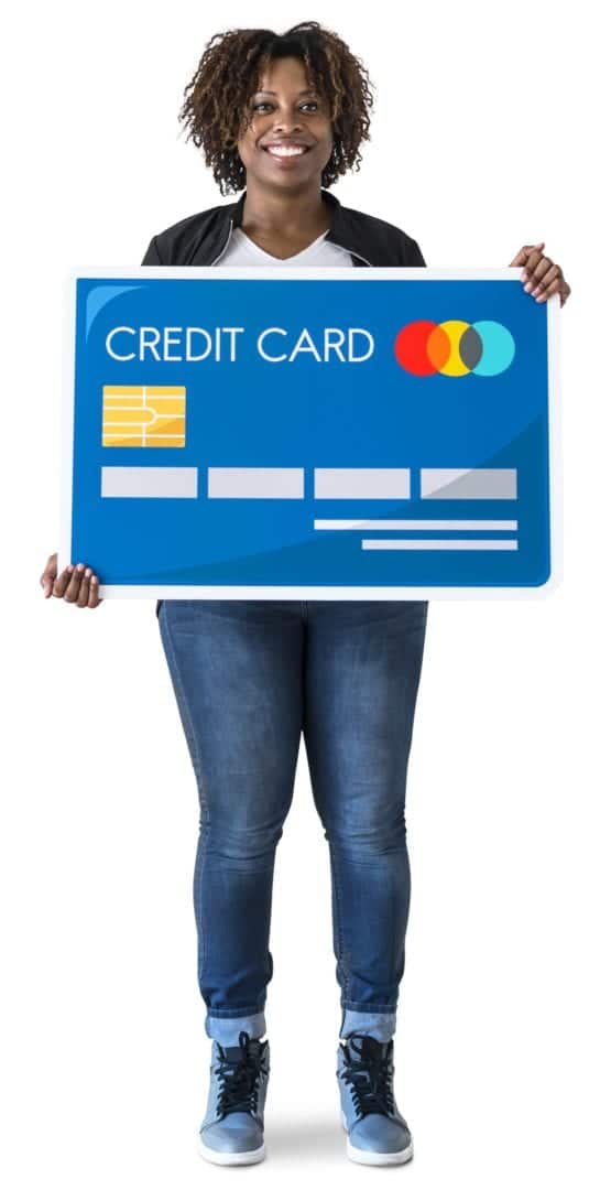 Black woman holding credit card isolated